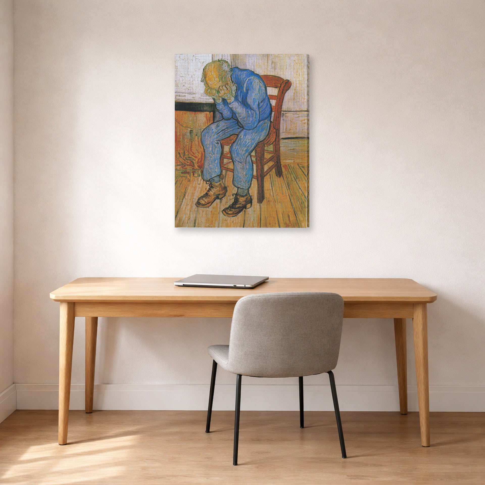 Gallery-wrapped canvas print of Vincent van Gogh's Old Man in Sorrow on the Threshold of Eternity displayed on a wall in a home office