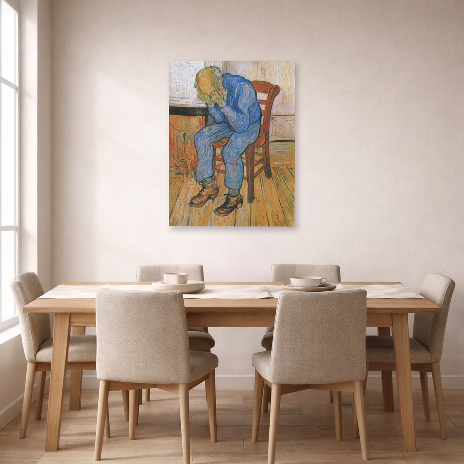 Unframed poster print of Vincent van Gogh's Old Man in Sorrow on the Threshold of Eternity displayed on a wall in a dining room