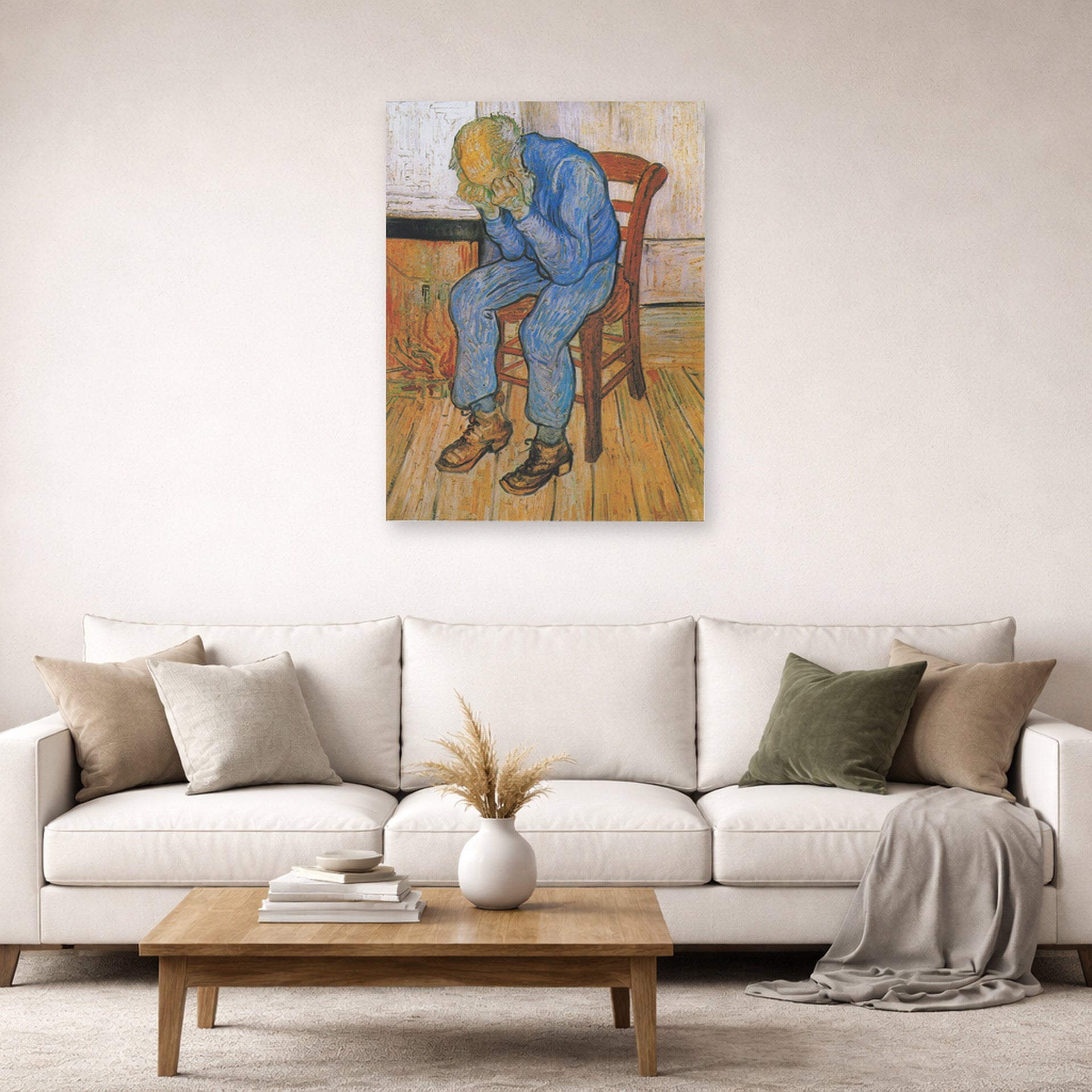 Unframed poster print of Vincent van Gogh's Old Man in Sorrow on the Threshold of Eternity displayed on a wall in a living room