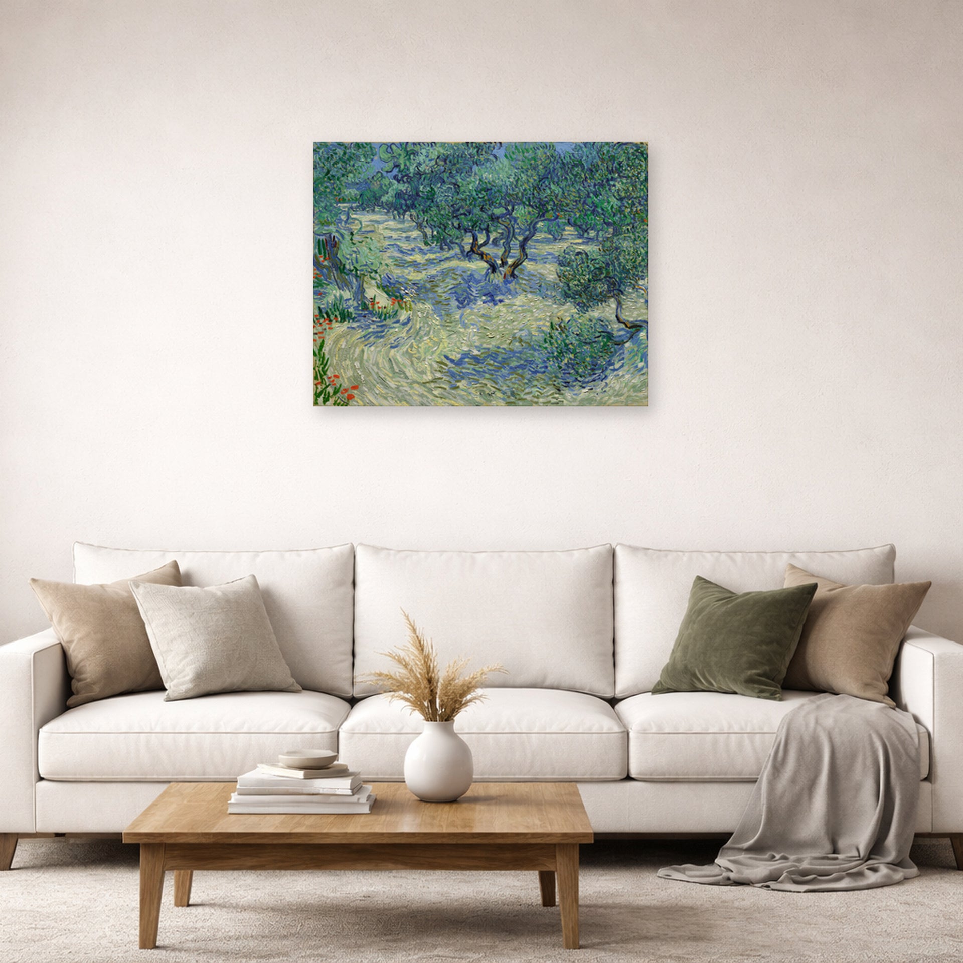 Unframed poster print of Vincent van Gogh's Olive Orchard displayed on a wall in a living room