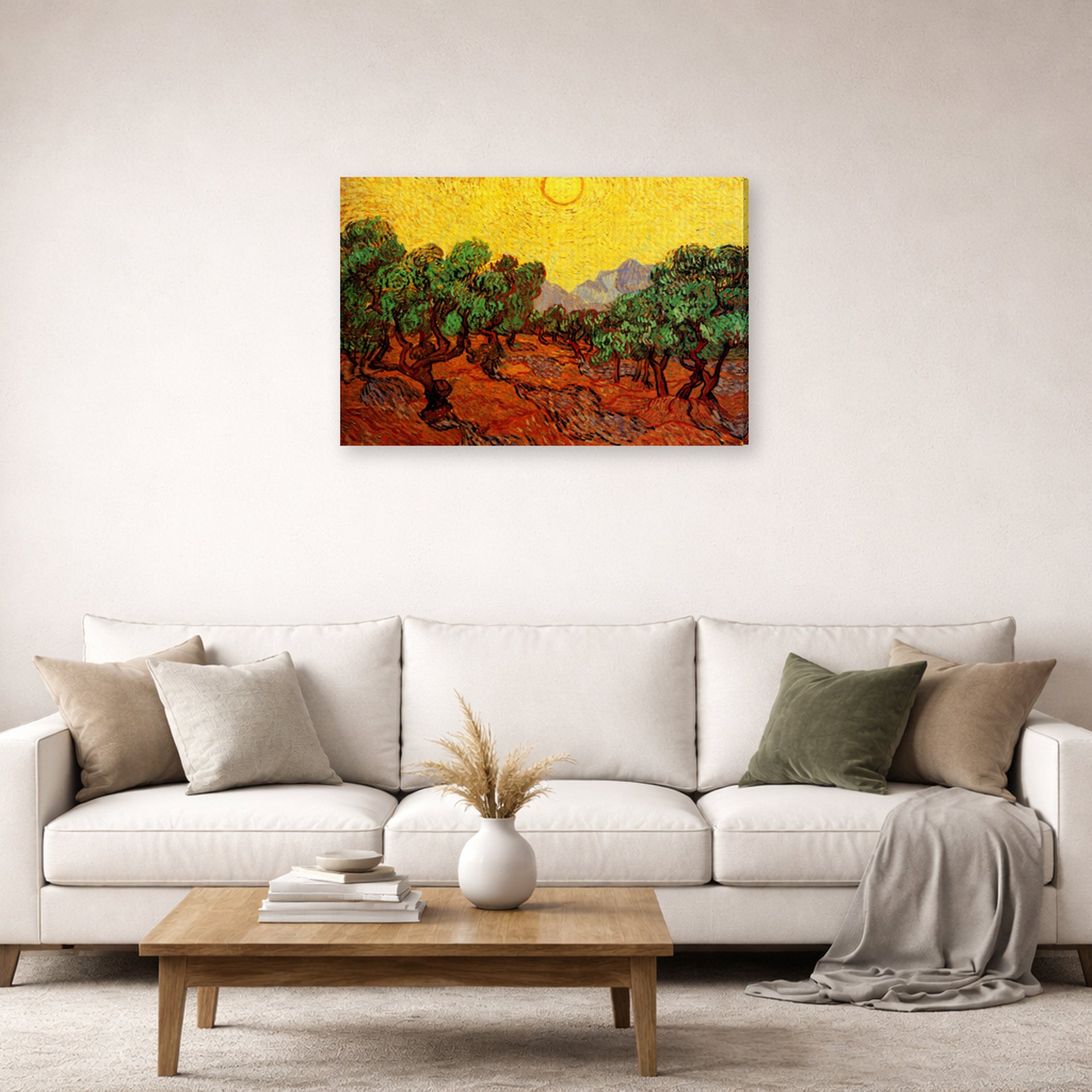 Gallery-wrapped canvas print of Vincent van Gogh's Olive Trees with Yellow Sky and Sun displayed on a wall in a living room