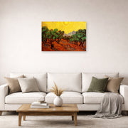 Unframed poster print of Vincent van Gogh's Olive Trees with Yellow Sky and Sun displayed on a wall in a living room