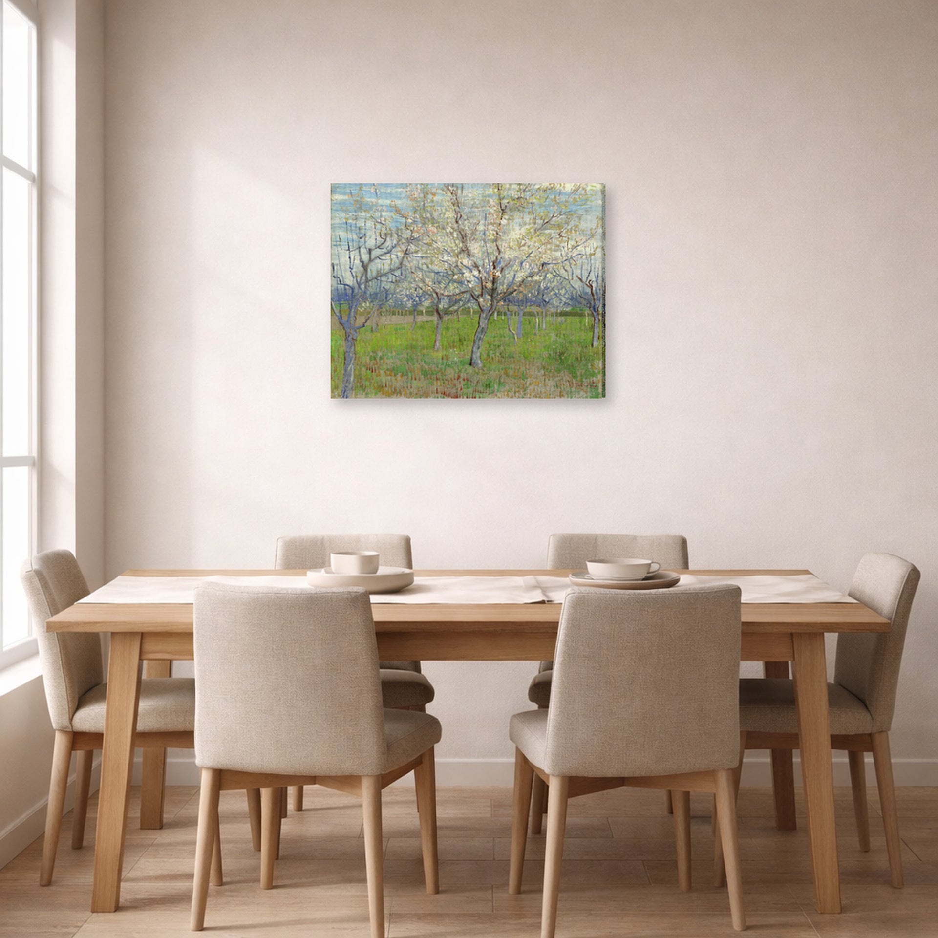 Gallery-wrapped canvas print of Vincent van Gogh's Orchard with Blossoming Apricot Trees displayed on a wall in a dining room