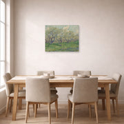 Unframed poster print of Vincent van Gogh's Orchard in Blossom displayed on a wall in a dining room