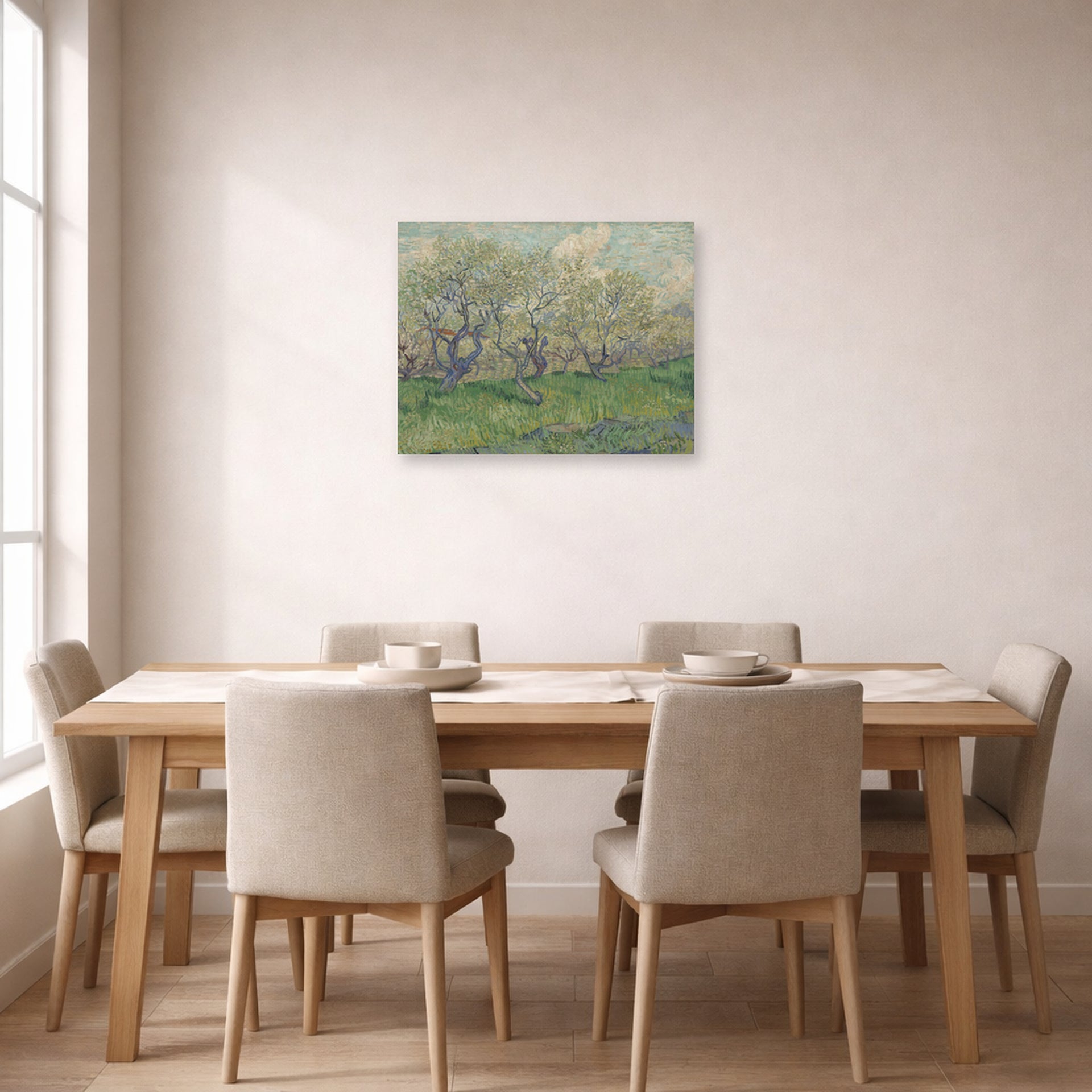 Unframed poster print of Vincent van Gogh's Orchard in Blossom displayed on a wall in a dining room