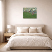 Unframed poster print of Vincent van Gogh's Orchards in Blossom, View of Arles displayed on a wall in a bedroom