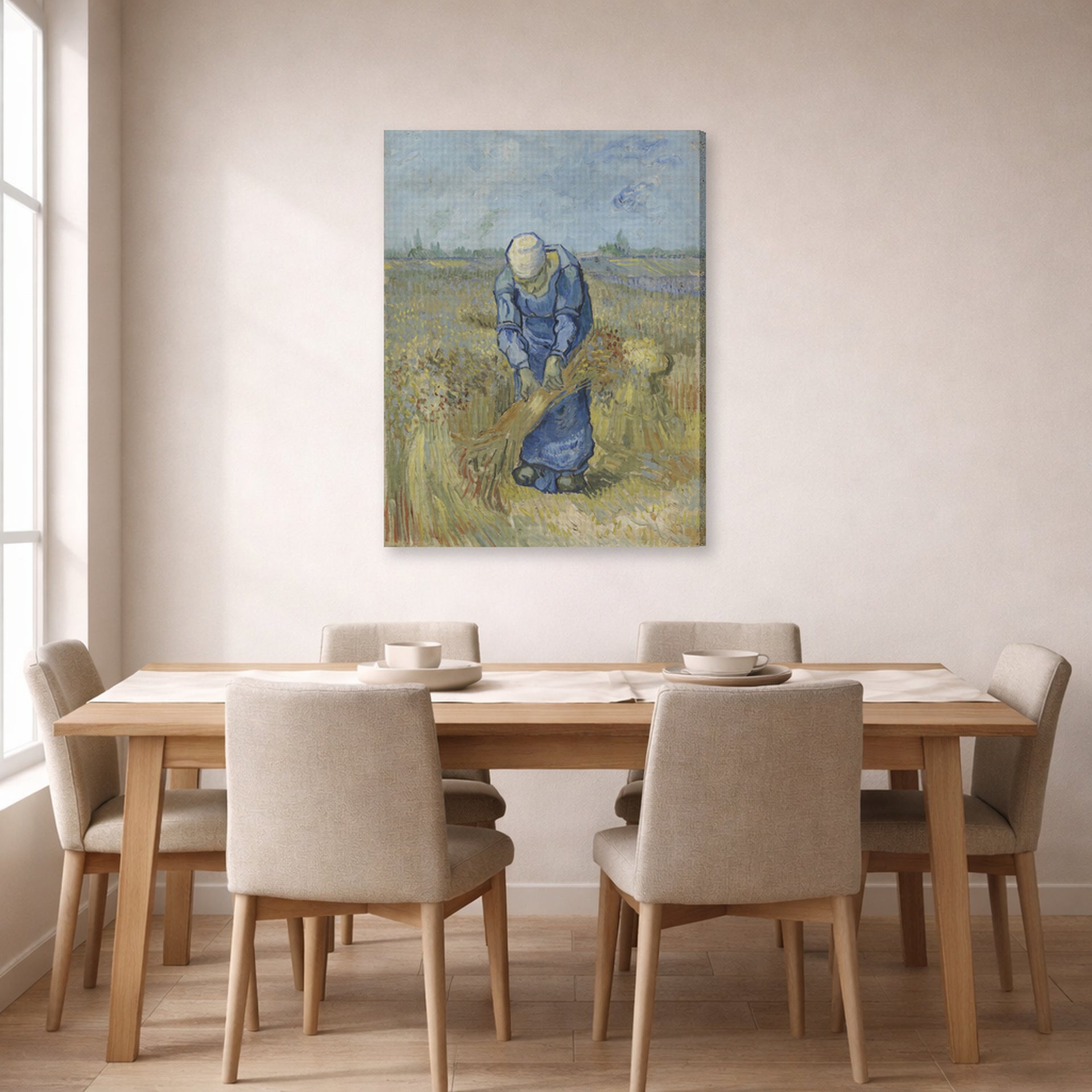 Gallery-wrapped canvas print of Vincent van Gogh's Peasant Woman Binding Sheaves displayed on a wall in a dining room