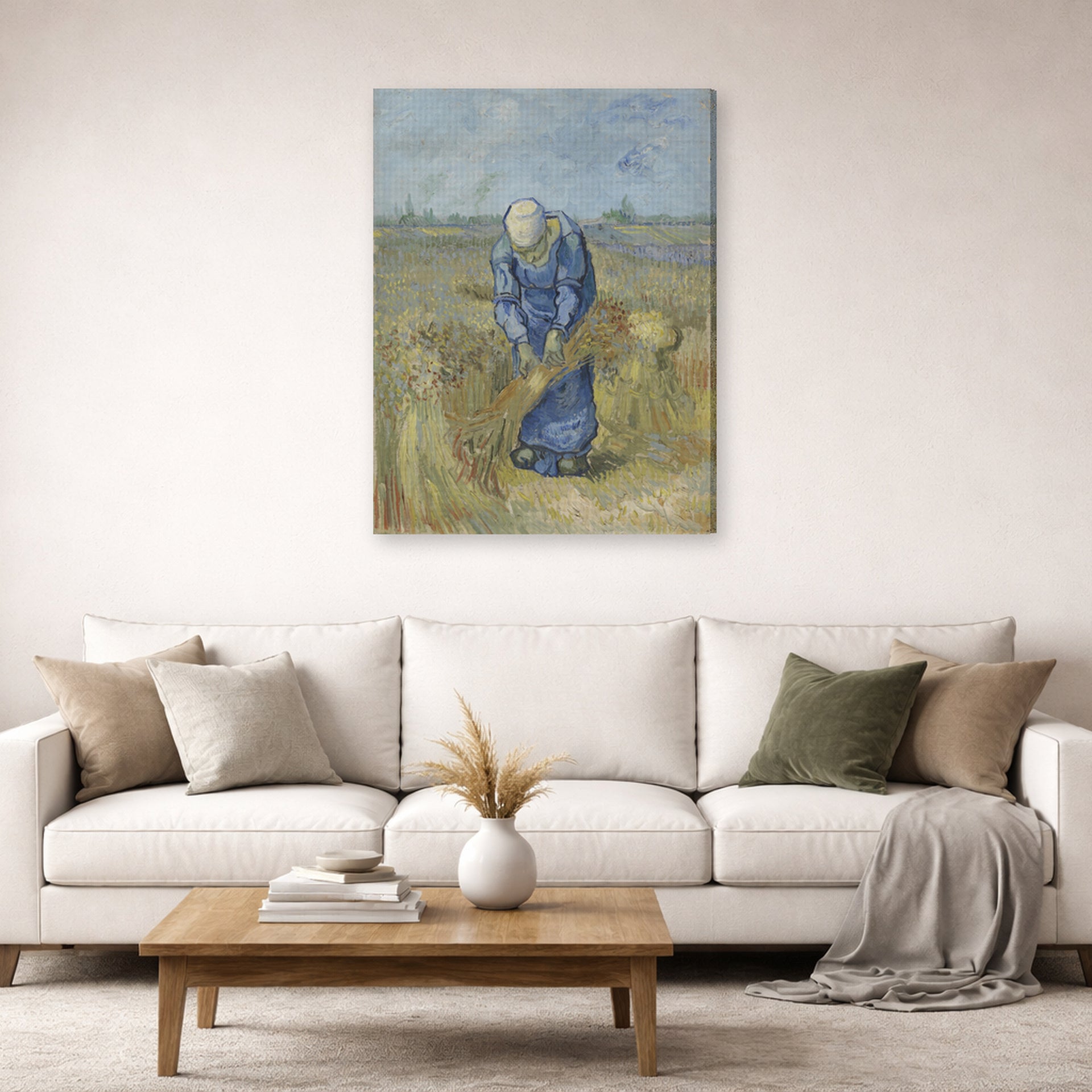 Gallery-wrapped canvas print of Vincent van Gogh's Peasant Woman Binding Sheaves displayed on a wall in a living room