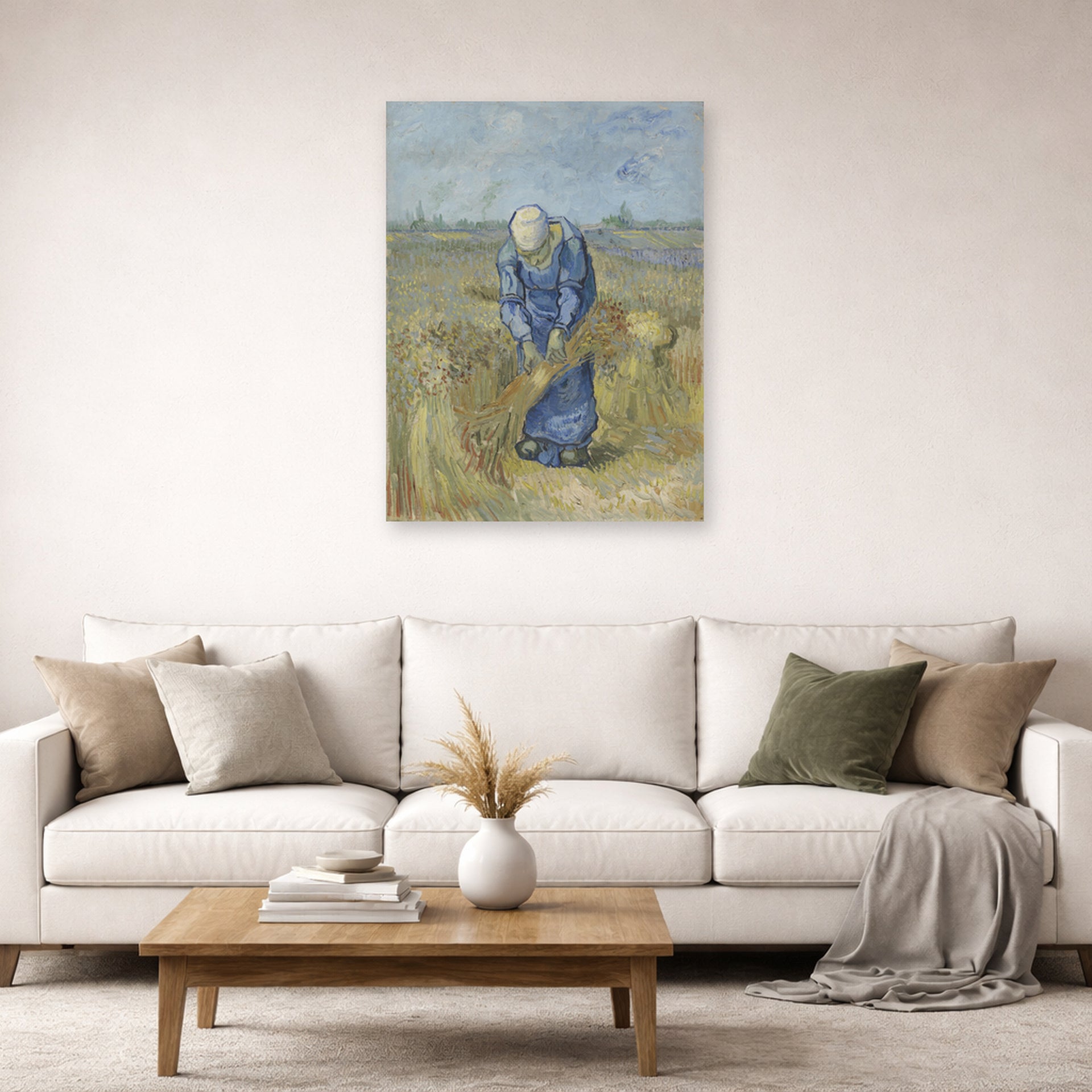 Unframed poster print of Vincent van Gogh's Peasant Woman Binding Sheaves displayed on a wall in a living room