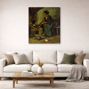 Gallery-wrapped canvas print of Vincent van Gogh's Peasant Woman Cooking by a Fireplace displayed on a wall in a living room