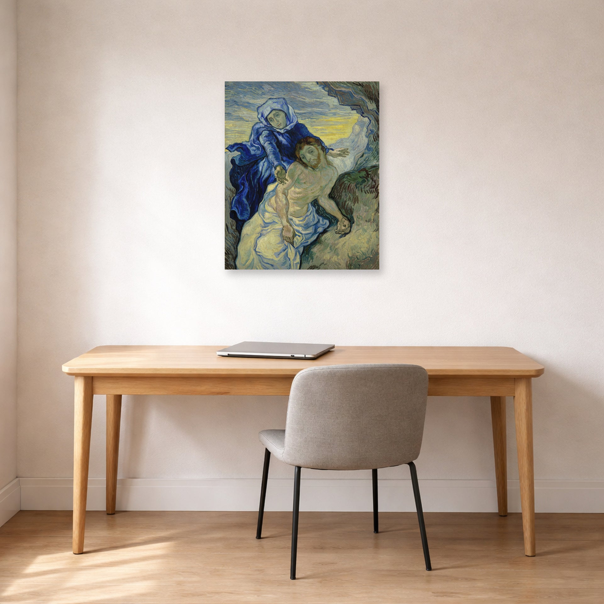 Unframed poster print of Vincent van Gogh's Pieta displayed on a wall in a home office