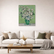 Unframed poster print of Vincent van Gogh's Pink Roses in a Vase displayed on a wall in a living room