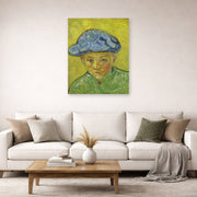 Unframed poster print of Vincent van Gogh's Portrait of Camille Roulin displayed on a wall in a living room