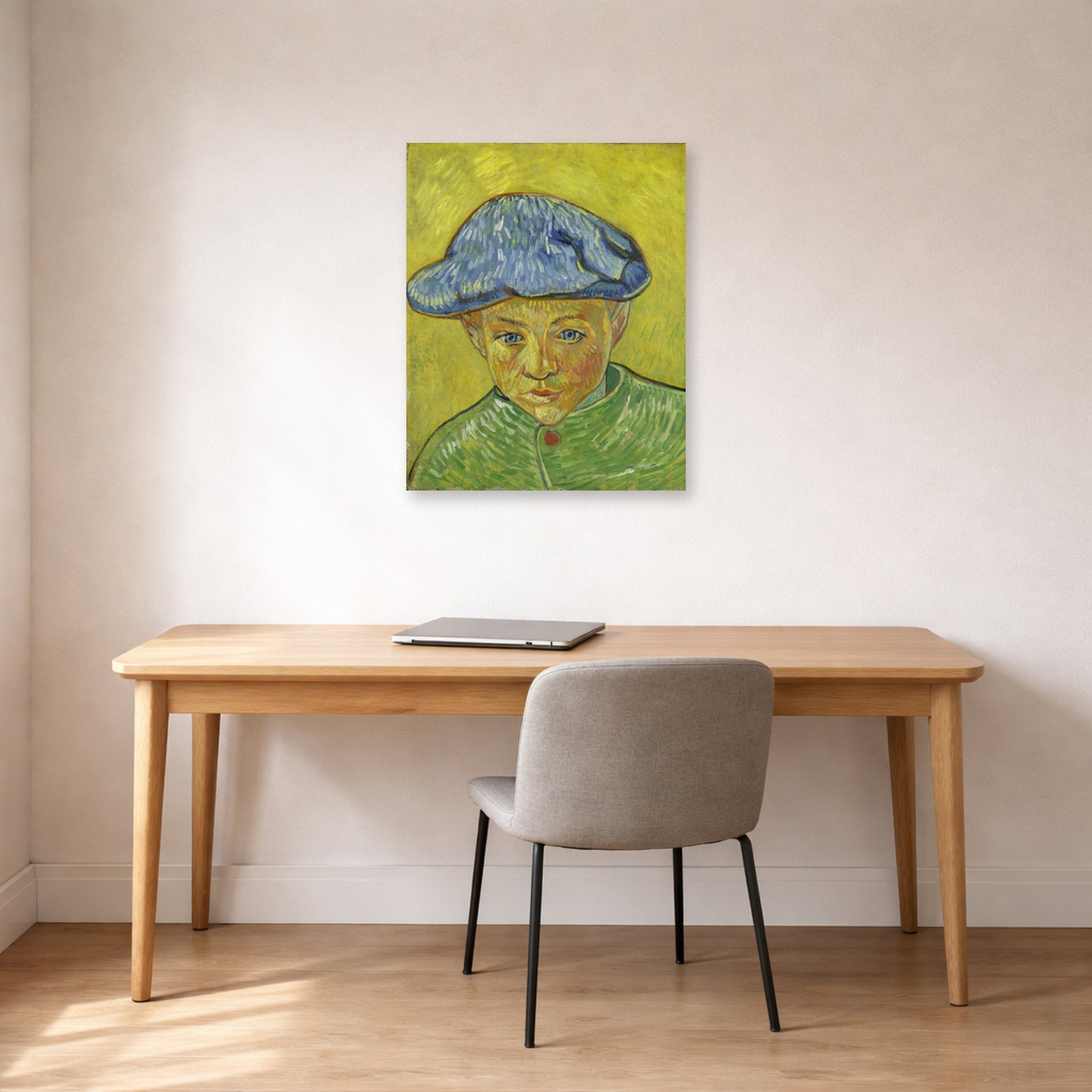 Unframed poster print of Vincent van Gogh's Portrait of Camille Roulin displayed on a wall in a home office