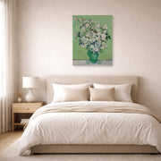 Unframed poster print of Vincent van Gogh's Roses displayed on a wall in a bedroom