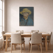 Unframed poster print of Vincent van Gogh's Self Portrait with Straw Hat and Pipe displayed on a wall in a dining room
