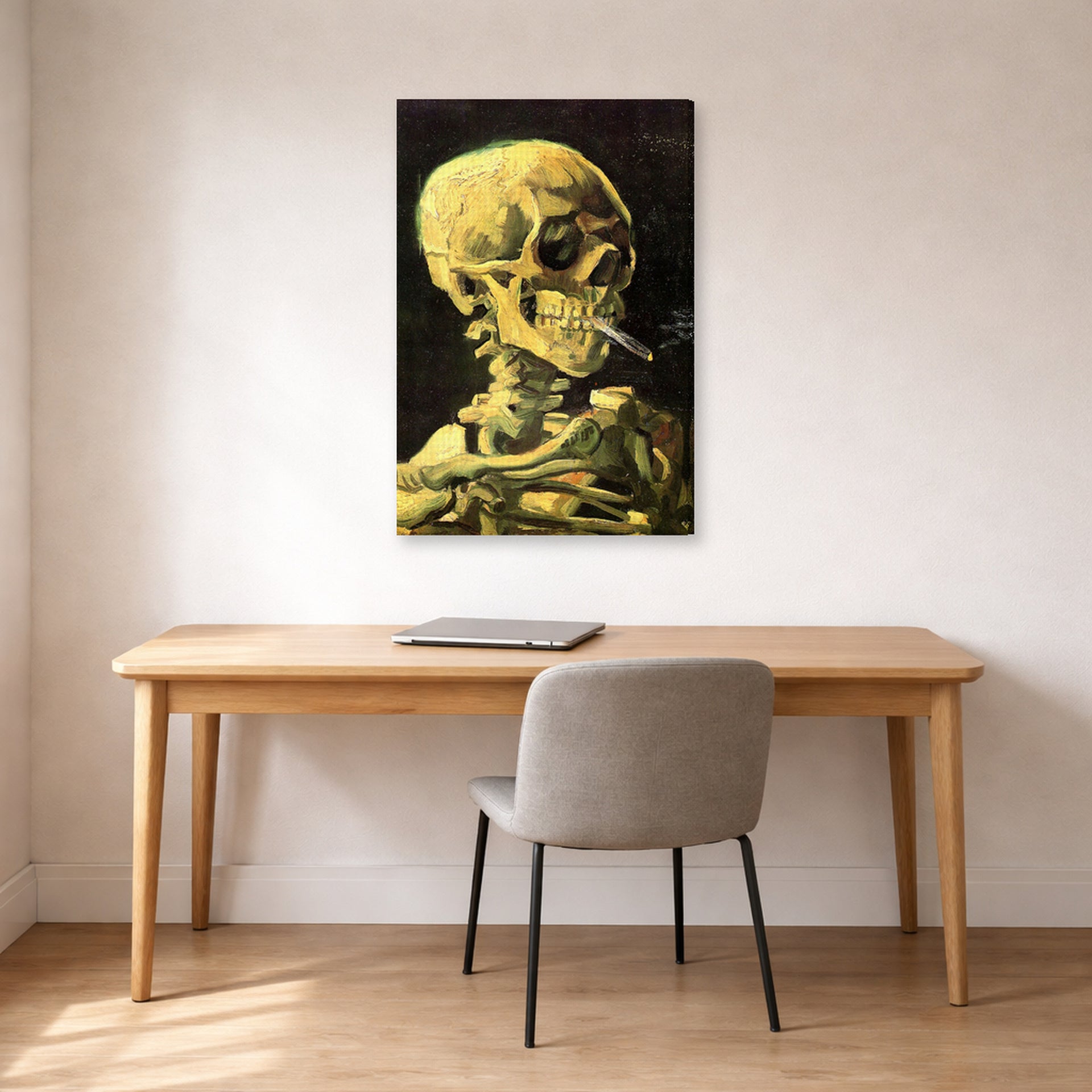 Gallery-wrapped canvas print of Vincent van Gogh's Skull with Burning Cigarette displayed on a wall in a home office