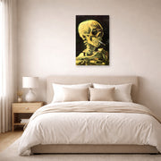 Unframed poster print of Vincent van Gogh's Skull with Burning Cigarette displayed on a wall in a bedroom