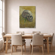 Gallery-wrapped canvas print of Vincent van Gogh's Skull displayed on a wall in a dining room