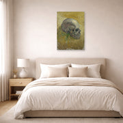 Unframed poster print of Vincent van Gogh's Skull displayed on a wall in a bedroom