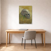 Unframed poster print of Vincent van Gogh's Skull displayed on a wall in a home office