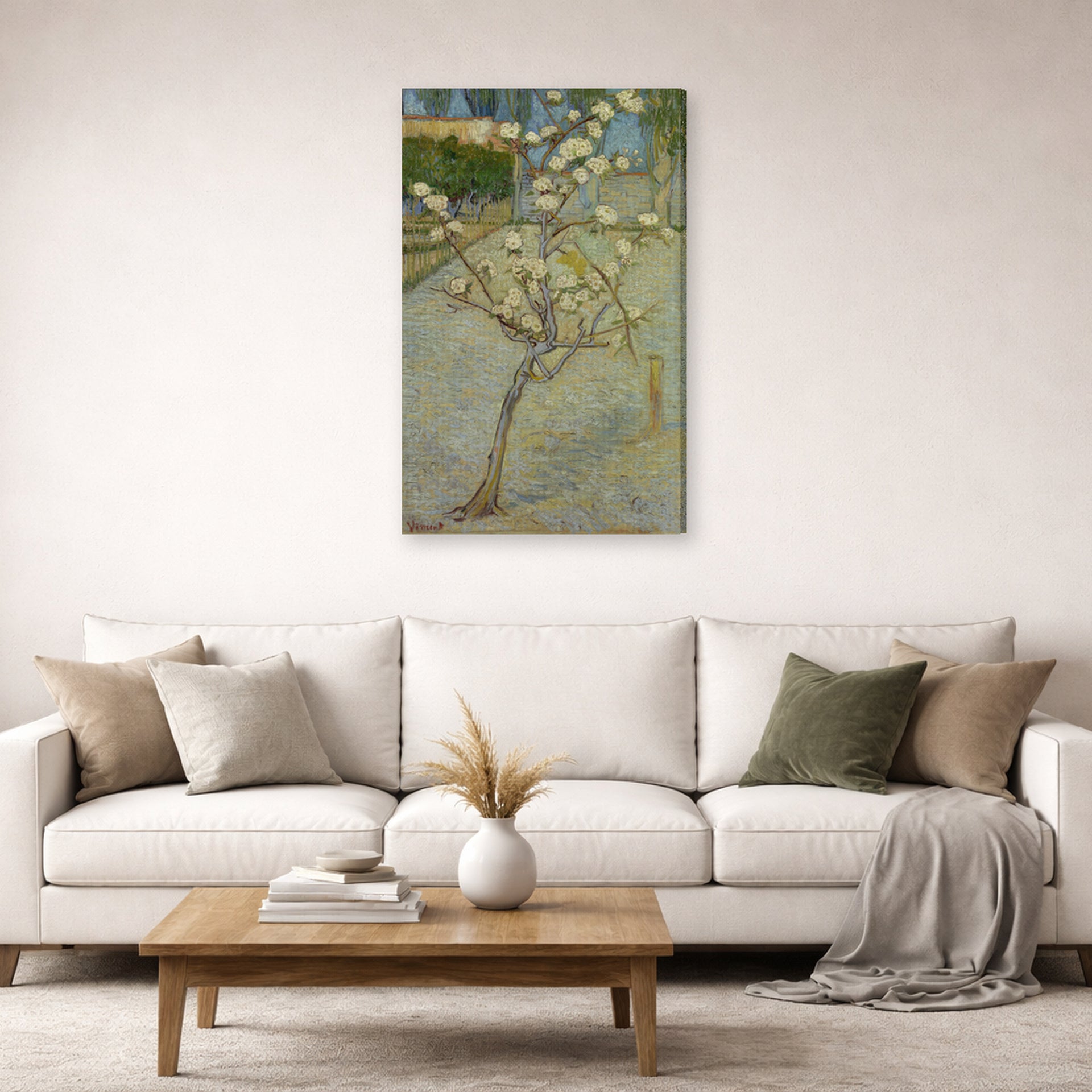 Gallery-wrapped canvas print of Vincent van Gogh's Small Pear Tree in Blossom displayed on a wall in a living room