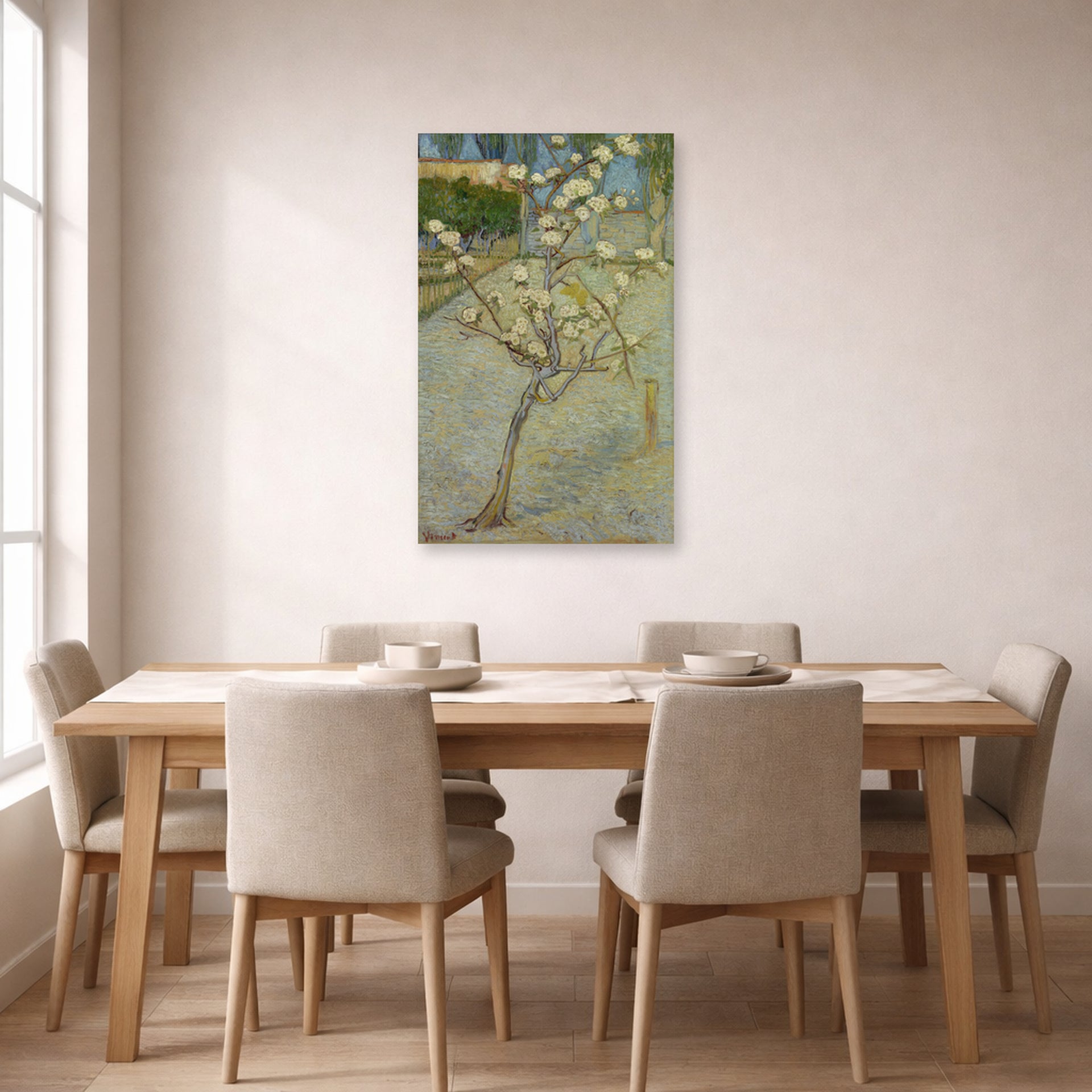 Unframed poster print of Vincent van Gogh's Small Pear Tree in Blossom displayed on a wall in a dining room