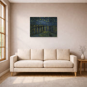 Gallery-wrapped canvas print of Vincent van Gogh's Starry Night displayed on a wall in a living room