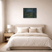 Unframed poster print of Vincent van Gogh's Starry Night displayed on a wall in a bedroom