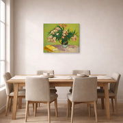 Gallery-wrapped canvas print of Vincent van Gogh's Still Life Vase with Oleanders and Books displayed on a wall in a dining room