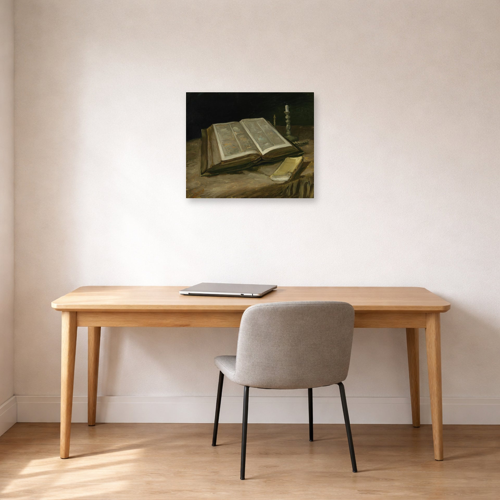 Unframed poster print of Vincent van Gogh's Still Life with Bible displayed on a wall in a home office