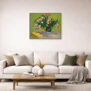 Unframed poster print of Vincent van Gogh's Still Life with Oleander displayed on a wall in a living room