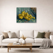 Gallery-wrapped canvas print of Vincent van Gogh's Still Life with Quinces Pears displayed on a wall in a living room