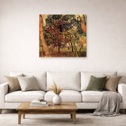 Gallery-wrapped canvas print of Vincent van Gogh's Study of Pine Trees displayed on a wall in a living room
