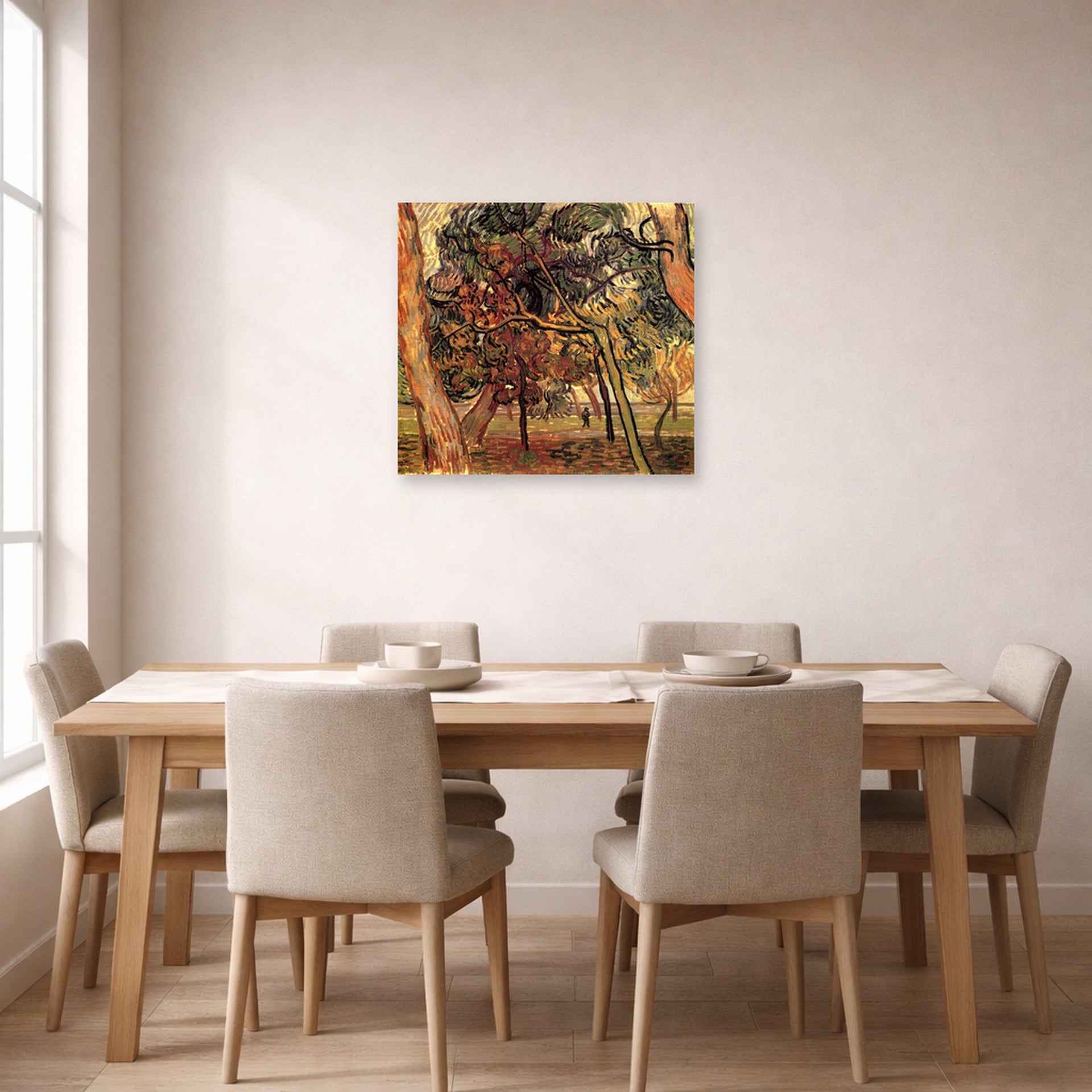 Unframed poster print of Vincent van Gogh's Study of Pine Trees displayed on a wall in a dining room