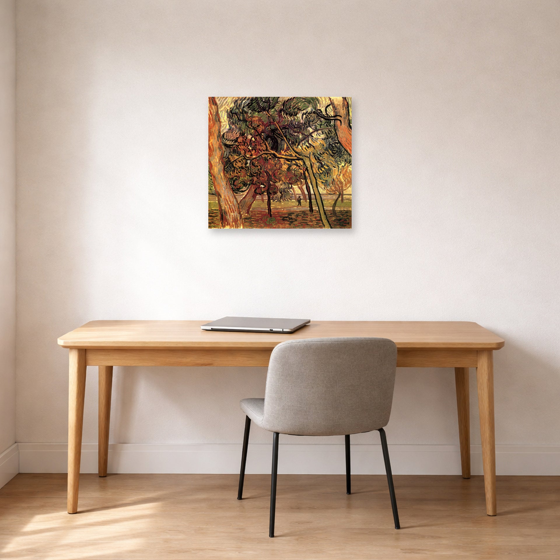 Unframed poster print of Vincent van Gogh's Study of Pine Trees displayed on a wall in a home office