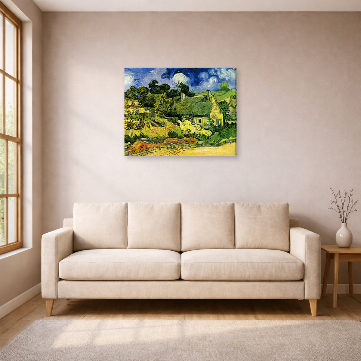 Gallery-wrapped canvas print of Vincent van Gogh's Thatched Cottages at Cordeville displayed on a wall in a living room
