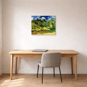 Gallery-wrapped canvas print of Vincent van Gogh's Thatched Cottages at Cordeville displayed on a wall in a home office