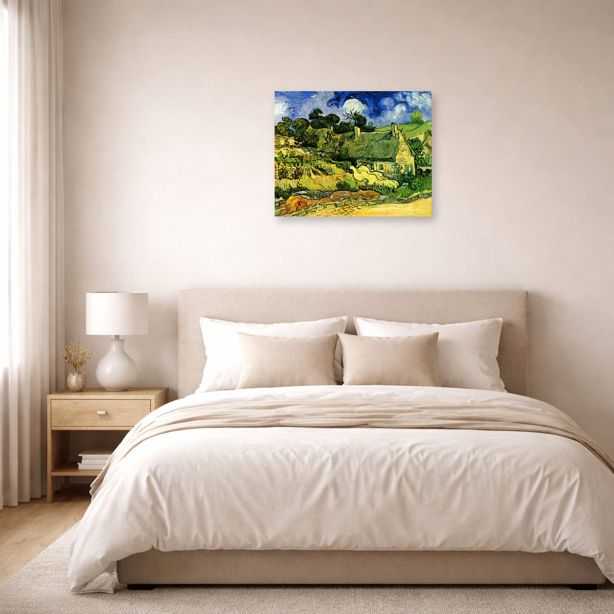 Unframed poster print of Vincent van Gogh's Thatched Cottages at Cordeville displayed on a wall in a bedroom