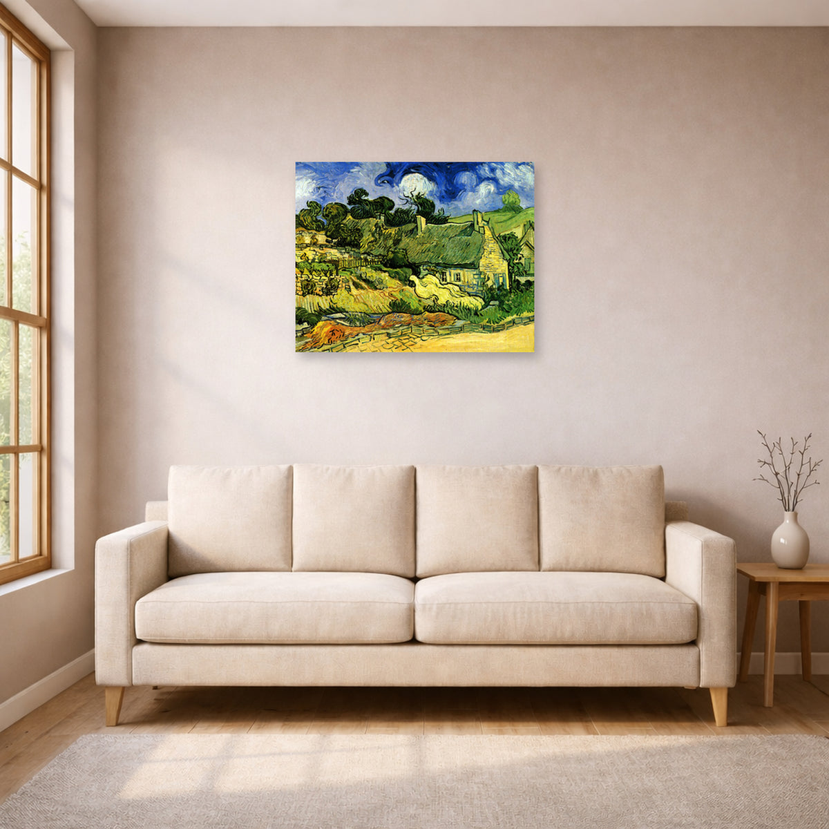 Unframed poster print of Vincent van Gogh's Thatched Cottages at Cordeville displayed on a wall in a living room