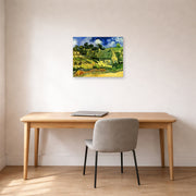 Unframed poster print of Vincent van Gogh's Thatched Cottages at Cordeville displayed on a wall in a home office