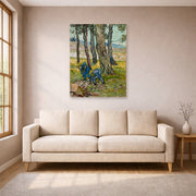 Unframed poster print of Vincent van Gogh's The Diggers displayed on a wall in a living room