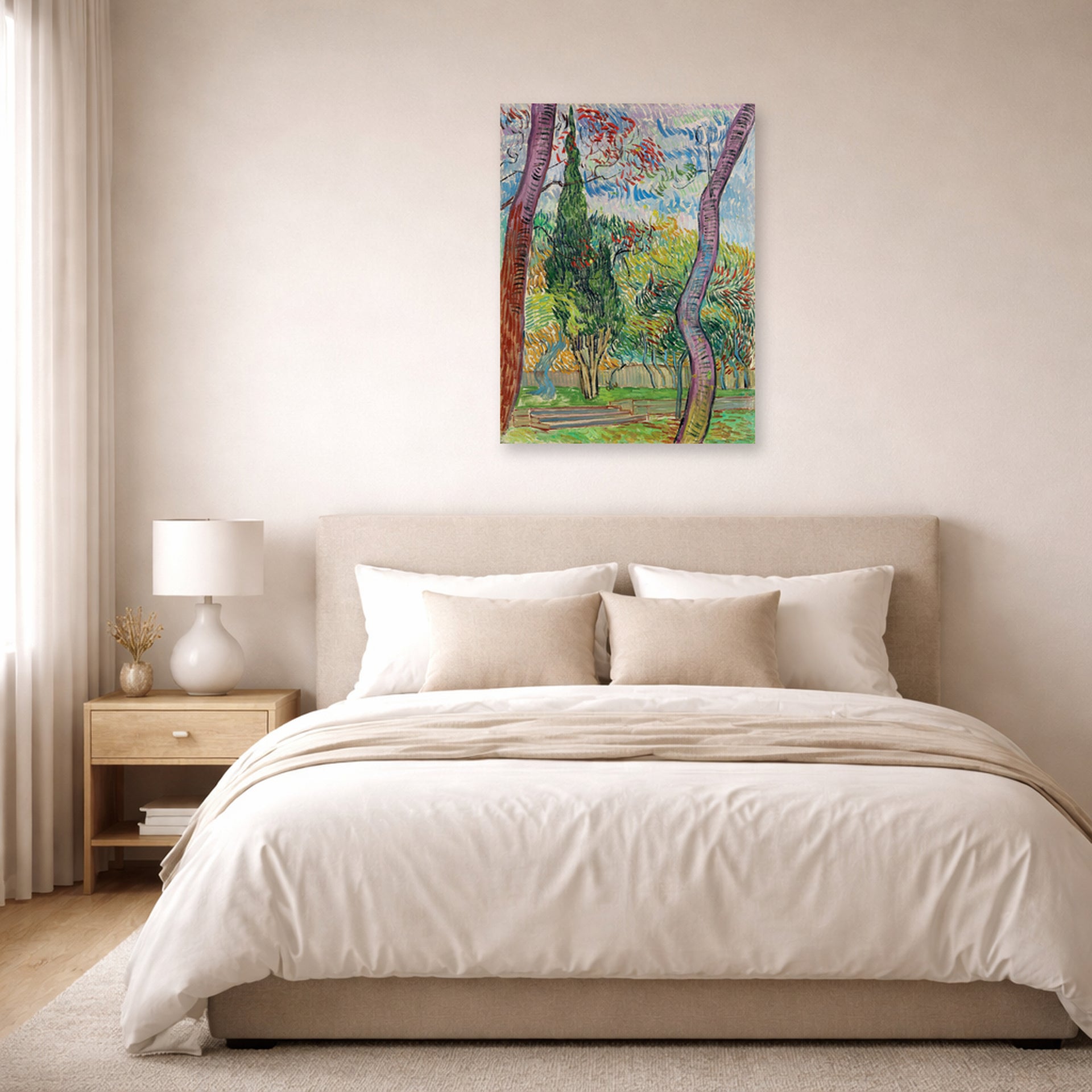 Unframed poster print of Vincent van Gogh's The Garden of Saint Paul Hospital displayed on a wall in a bedroom
