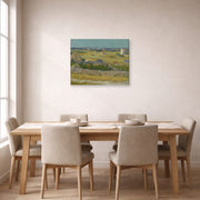 Gallery-wrapped canvas print of Vincent van Gogh's The Harvest displayed on a wall in a dining room