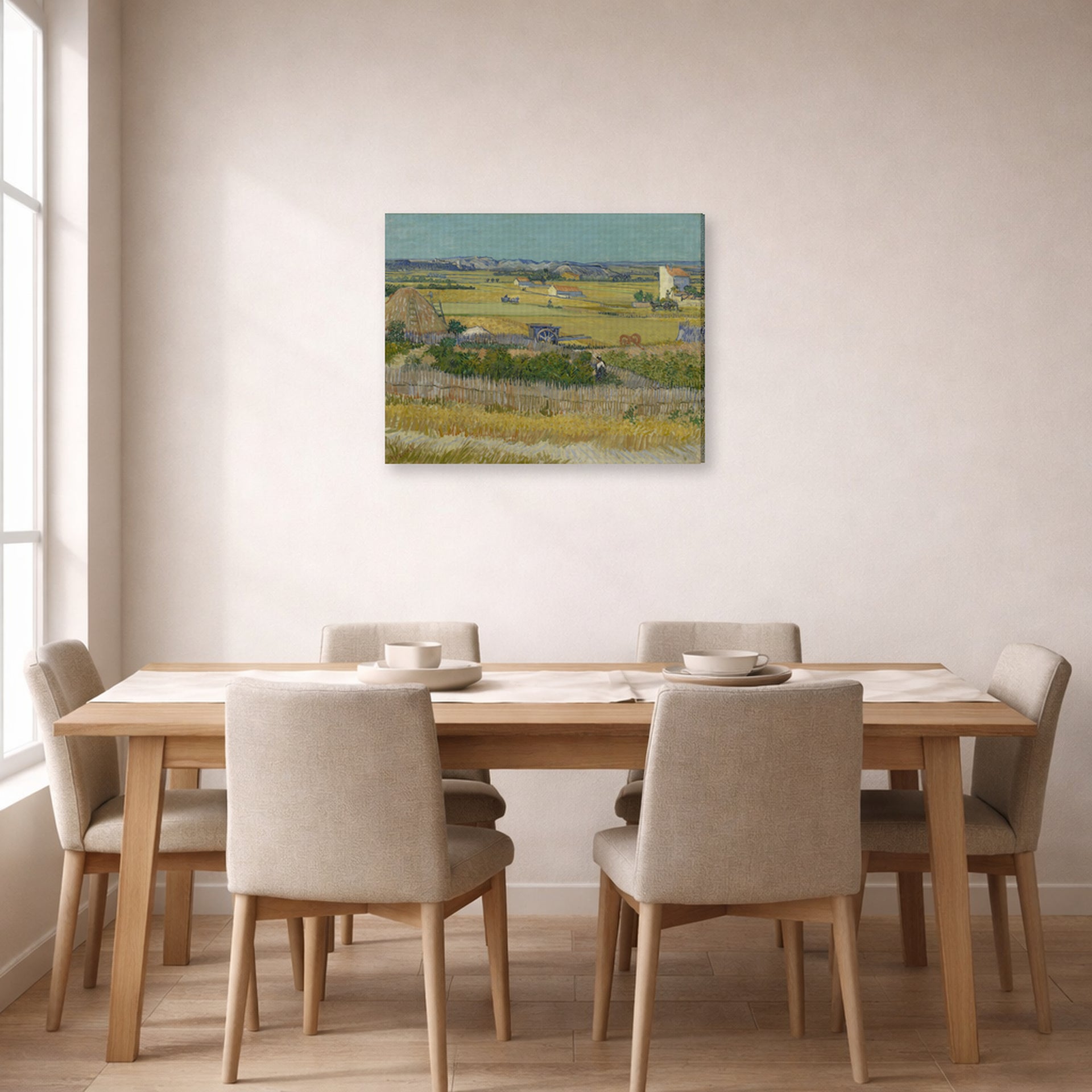 Gallery-wrapped canvas print of Vincent van Gogh's The Harvest displayed on a wall in a dining room