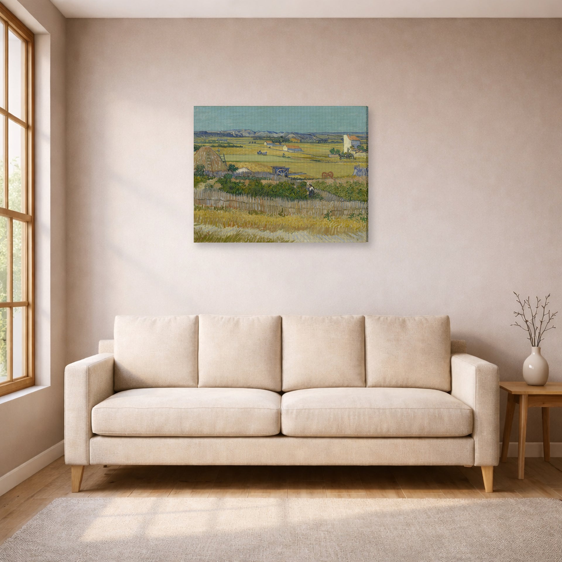 Gallery-wrapped canvas print of Vincent van Gogh's The Harvest displayed on a wall in a living room