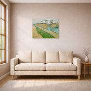 Unframed poster print of Vincent van Gogh's The Langlois Bridge displayed on a wall in a living room