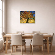 Unframed poster print of Vincent van Gogh's The Mulberry Tree displayed on a wall in a dining room