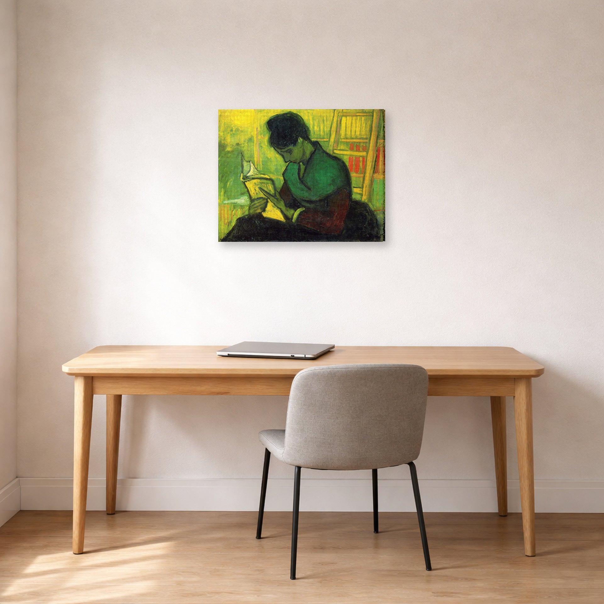 Gallery-wrapped canvas print of Vincent van Gogh's The Novel Reader displayed on a wall in a home office