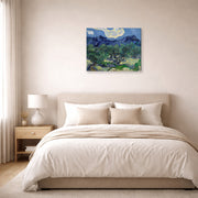 Gallery-wrapped canvas print of Vincent van Gogh's The Olive Trees displayed on a wall in a bedroom